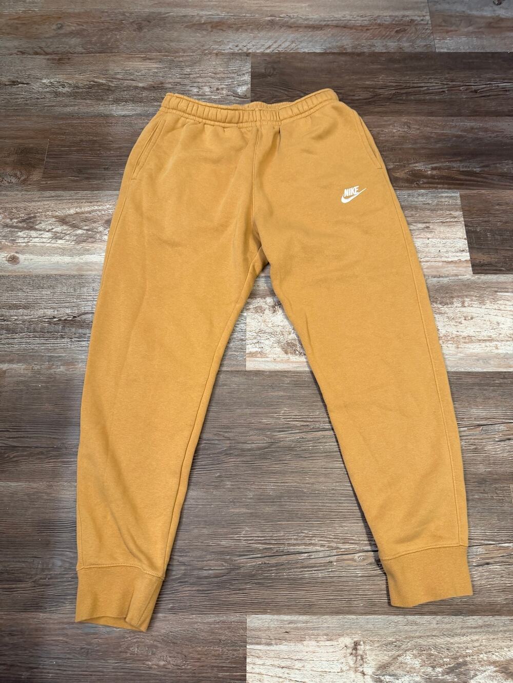 Nike Sportswear Club Fleece joggers in a golden tan color Men’s size Medium EUC